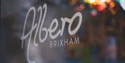 logo and pictures of the harbour and food