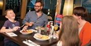 Family eating at TLH Victoria Hotel, Torquay, Devon