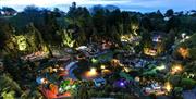 Night time garden view at Babbacombe Model Village, Torquay, Devon