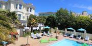 View of the swimming pool and sun terrace The Cimon