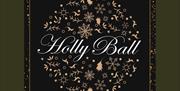 The Holly Ball logo with dark background and Christmas motifs all in black, gold and dark green