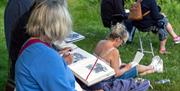Sketching at the Apple Orchard overlooking Cockington Court