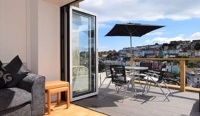 Bay Dream Believer lounge area and balcony