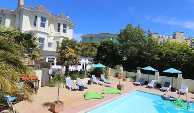 View of the swimming pool and sun terrace The Cimon