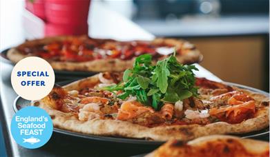 Fresh from the Sea to Your Slice – Shoreline’s Seafood Pizza Deal!