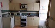 Kitchen area at Sandmoor Holiday Apartments, Paignton, Devon