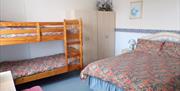 Family bedroom at Sandmoor Holiday Apartments, Paignton, Devon