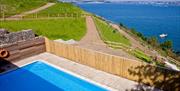 Shared outdoor swimming pool, Curlew 2, The Cove, Brixham, Devon