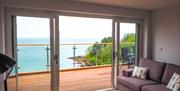 Lounge with sea view from Osprey 2, The Cove, Brixham