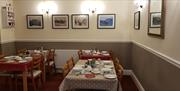 Dining area at Blue Waters Lodge, Paignton, Devon