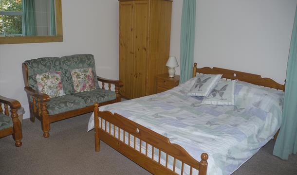 Bedroom at Broadshade Holiday Flats, Paignton, Devon