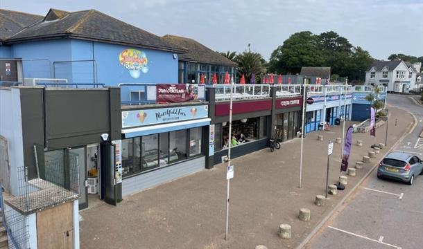 The front of Splashdown Quaywest in Paignton, Devon. Showing the Marshfield Ice Cream counter, Costa Coffee and Sunrise Shop.