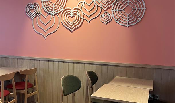 An interior shot of Costa Coffee Quaywest showing heart decoration on the wall.