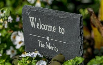 Welcome to The Morley sign