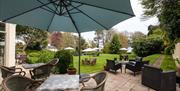 Outside seating and garden at Hotel Balmoral, Torquay, Devon