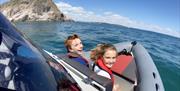 Children having fun on Coastal Boat Tour, Torbay.