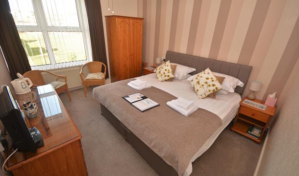 Merritt House Bed and Breakfast king size bedroom interior in Paignton Devon.