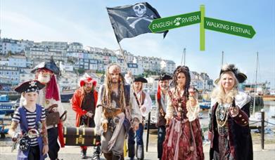 People dressed as pirates at the Brixham Pirate Festival