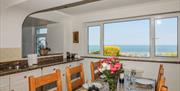 Dining area and kitchen, Panoramic Cottage,1 Queens Road, Brixham, Devon