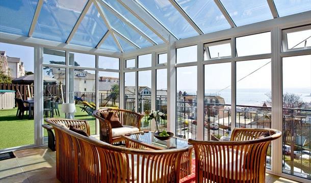 Conservatory with view, The Penthouse, 7 Roundham Heights, Alta Vista Road, Paignton, Devon