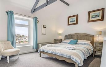 Pilotage Cottage Brixham. Double bedroom with views out to picturesque Brixham.
