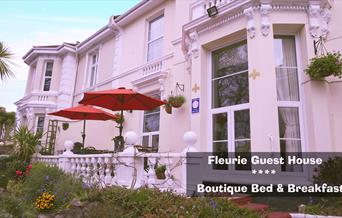 Time to sit and enjoy the sunshine at Fleurie House, Torquay, Devon. Front of Property