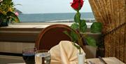 Table with  a view at the Livermead Cliff Hotel, Torquay, Devon