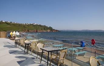 Seaside terrace seating at Venus Cafe, Broadsands Beach, Paignton