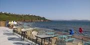 Seaside terrace seating at Venus Cafe, Broadsands Beach, Paignton