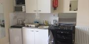Kitchen area at Adelphi Holiday Apartments in Paignton, Devon