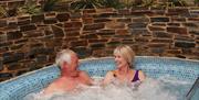 Couple in jacuzzi at The Carlton Hotel Torquay, Devon