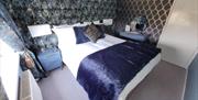Junior Suite with separate lounge with TV & en suite bathroom @ The Station Guest House, Churston Ferrers, Nr Brixham, Devon