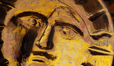 Gold sun artefact