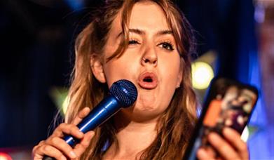 Join Lou Barron's BIG fat quiz, hosted weekly by the devilishly funny comedian Lou Barron!