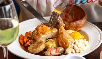 This Father's Day, gather your loved ones and indulge in a quintessential Sunday roast at the Trafalgar Tavern