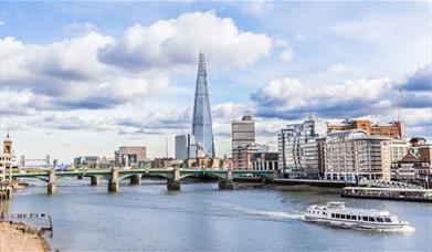 Thames River Sightseeing boat cruising on river Thames