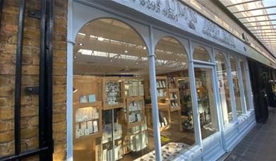 Outside Autumn and May in Greenwich, with a elegant and well presented shopfront and windows showing a stunning inside.