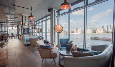 The Sail Loft has panoramic views of the river Thames from its floor to ceiling windows.