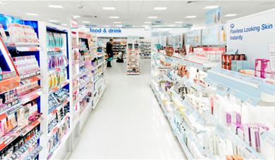 Inside Boots, showing a nice looking and well stocked shop.