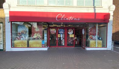 Clinton Cards Eltham. Showing a red and white building.