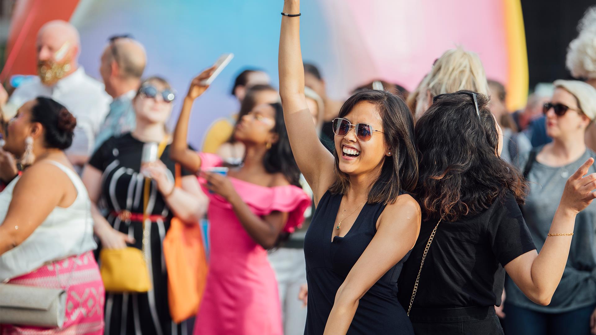 A woman dances at a festival event in Greenwich.