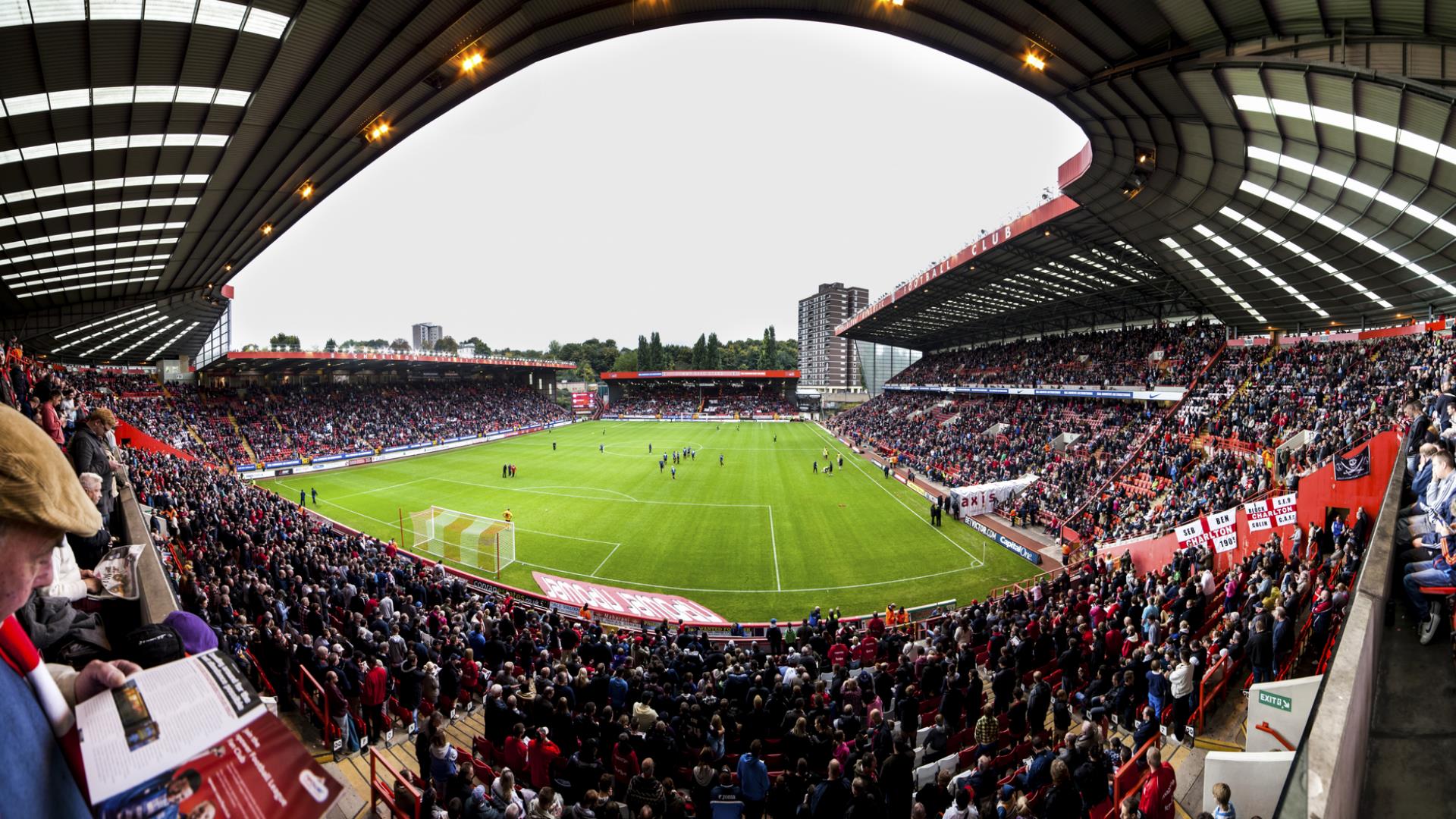 A crowd attend a match at Charlton Athletic Football Club.