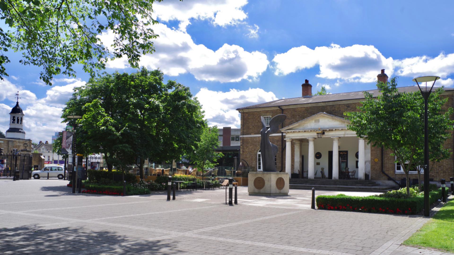 The main gate to the Royal Arsenal in Woolwich next to the original Guard House, now a pub.