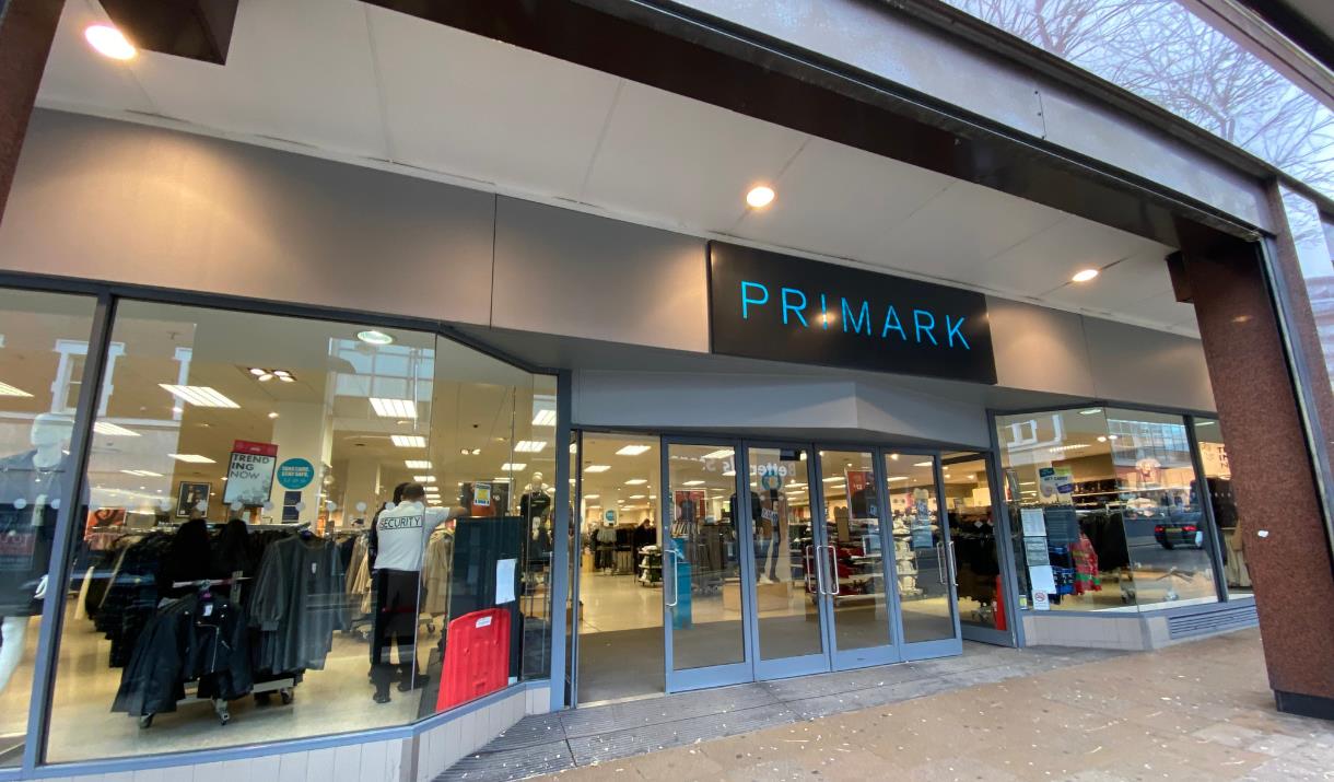 A photo taken outside of Primark, showing a fashion paradise filled with a huge variety of items.