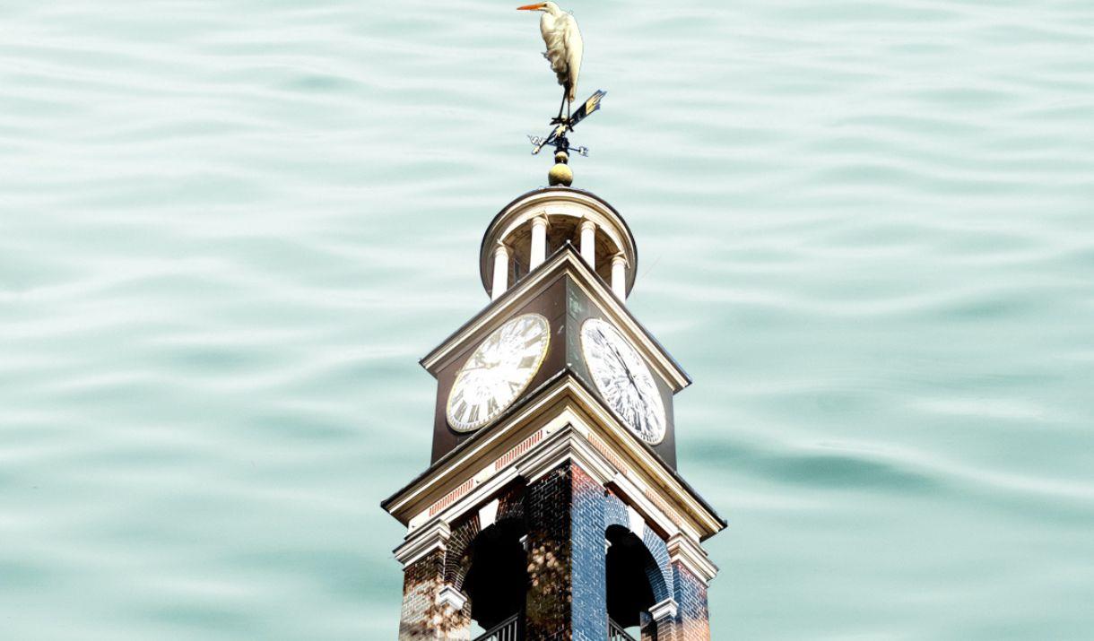 This beautifully restored Nelson’s Clock is hauled onto a barge in Deptford and sailed down the Thames