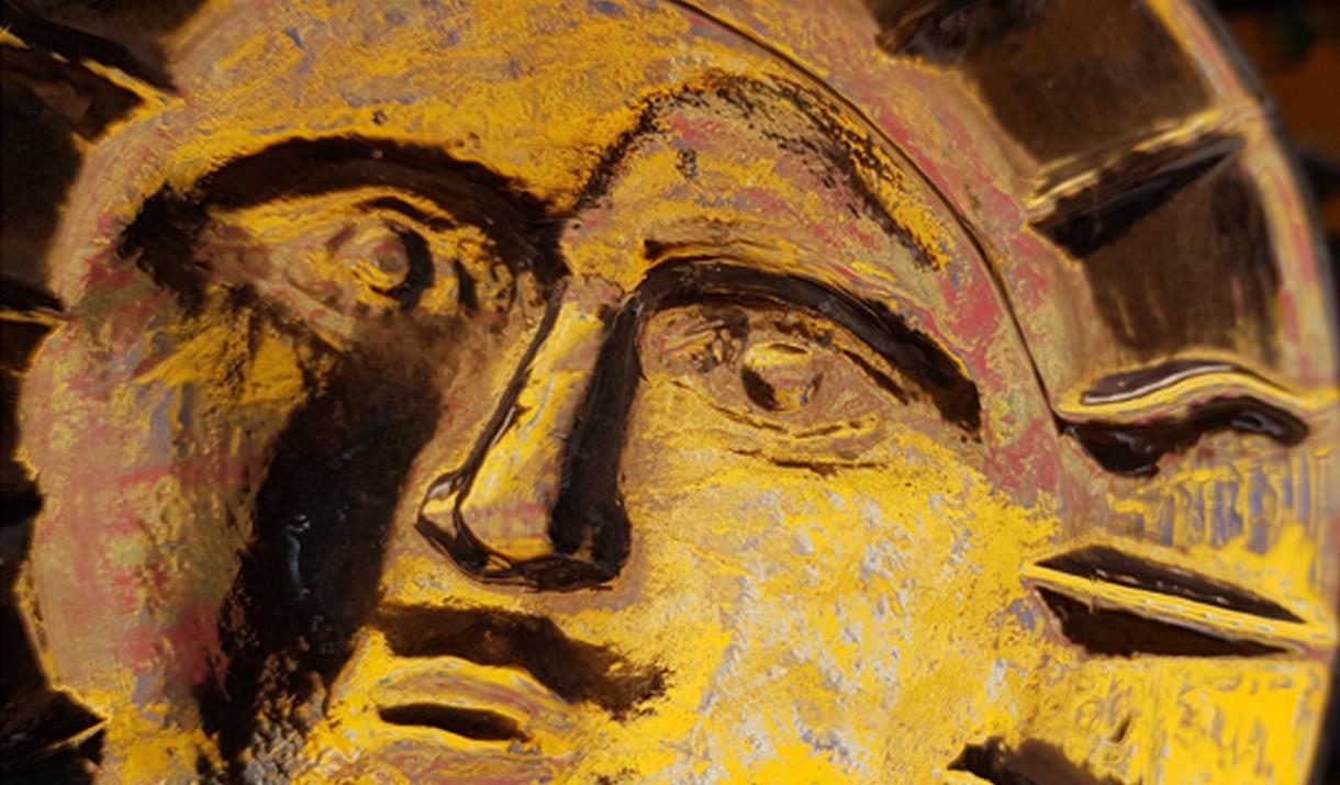 Gold sun artefact