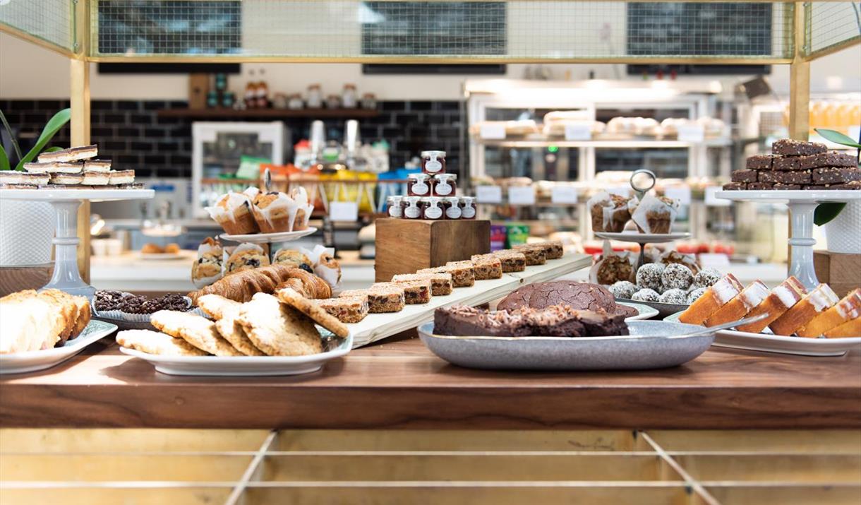 Located inside the Cutty Sark Café, showing a room filled with delicious snacks.