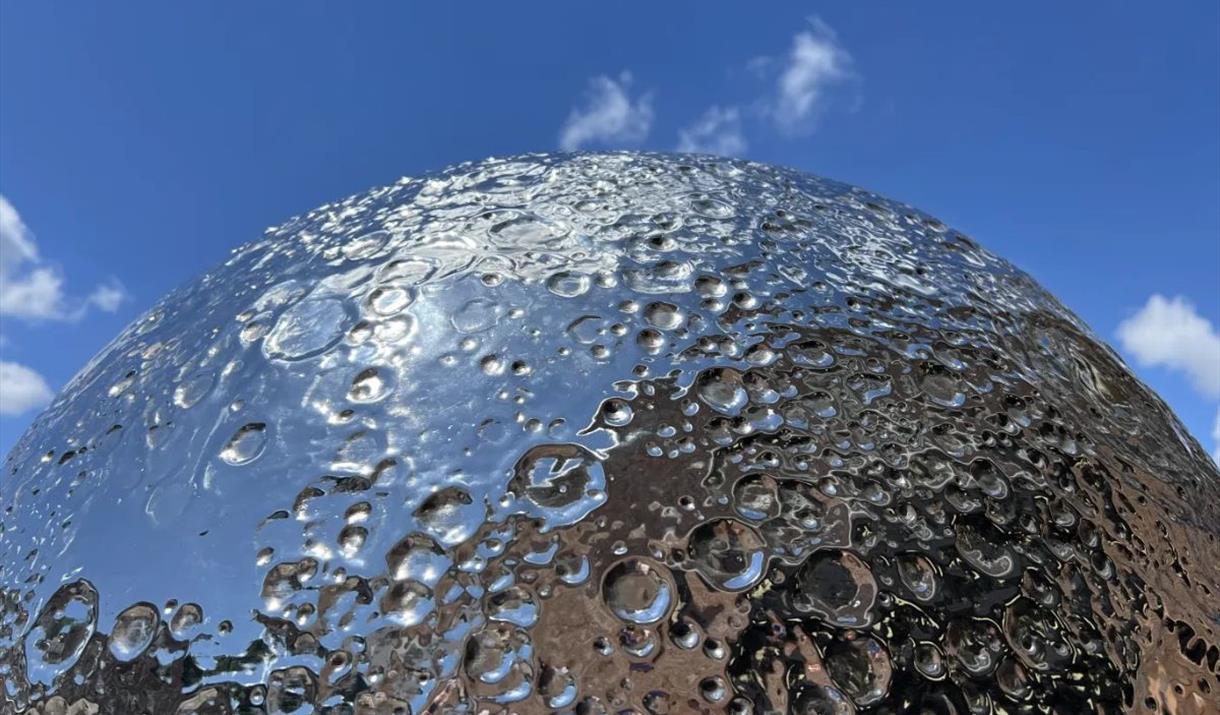 A new installation by artist Luke Jerram 'Mirror Moon' arrives at the Royal Observatory in March 2026 - see and feel the lunar surface like never befo