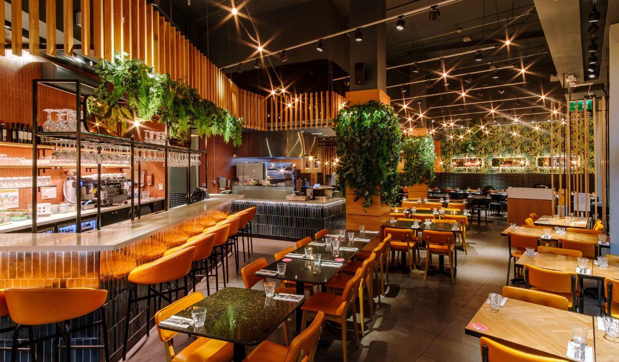 Interior of PizzaExpress at The O2 with modern setting and bright lighting