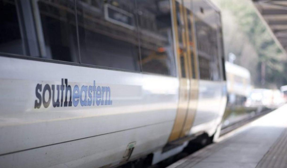 A Southeastern Railway train at a station platform.